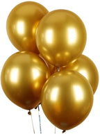 Gold balloons on a white background
