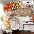 Balloon arch with 'Oh Baby' sign in a room setting