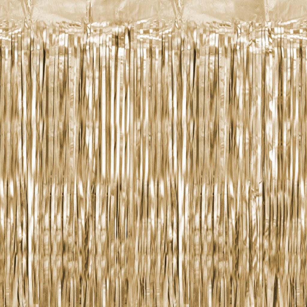 Champagne gold metallic fringe tinsel curtain backdrop with a textured pattern