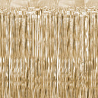 Champagne gold metallic fringe tinsel curtain backdrop with a textured pattern