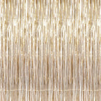 Champagne gold metallic fringe tinsel curtain backdrop with vertical lines