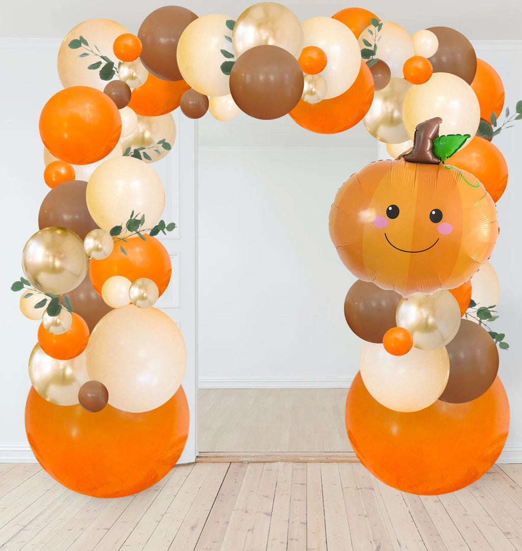 Balloon arch with pumpkins and autumn colors on a white background