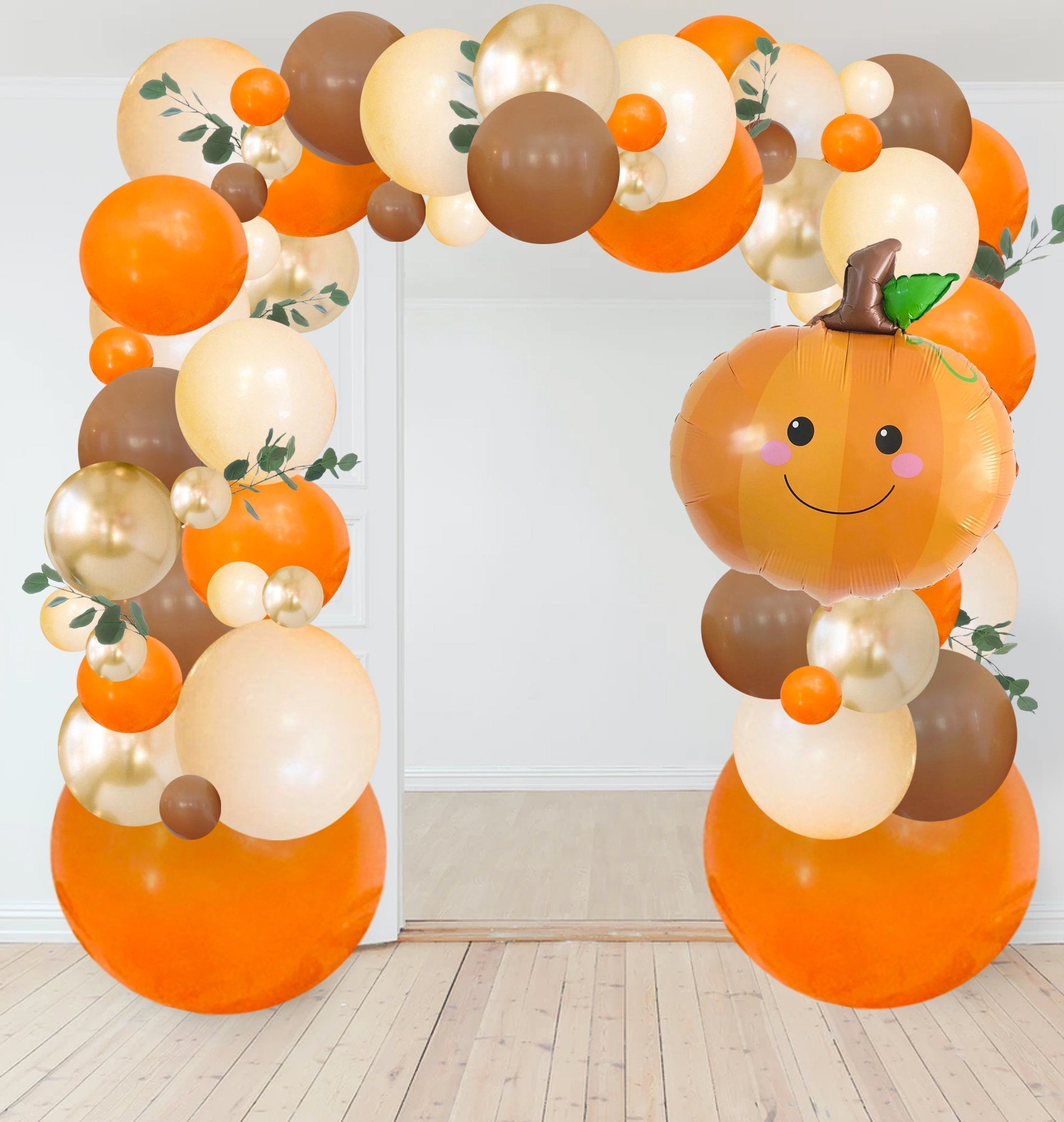 Balloon arch with pumpkins and autumn colors on a white background