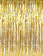 Gold metallic fringe tinsel curtain backdrop  with a shiny, reflective surface