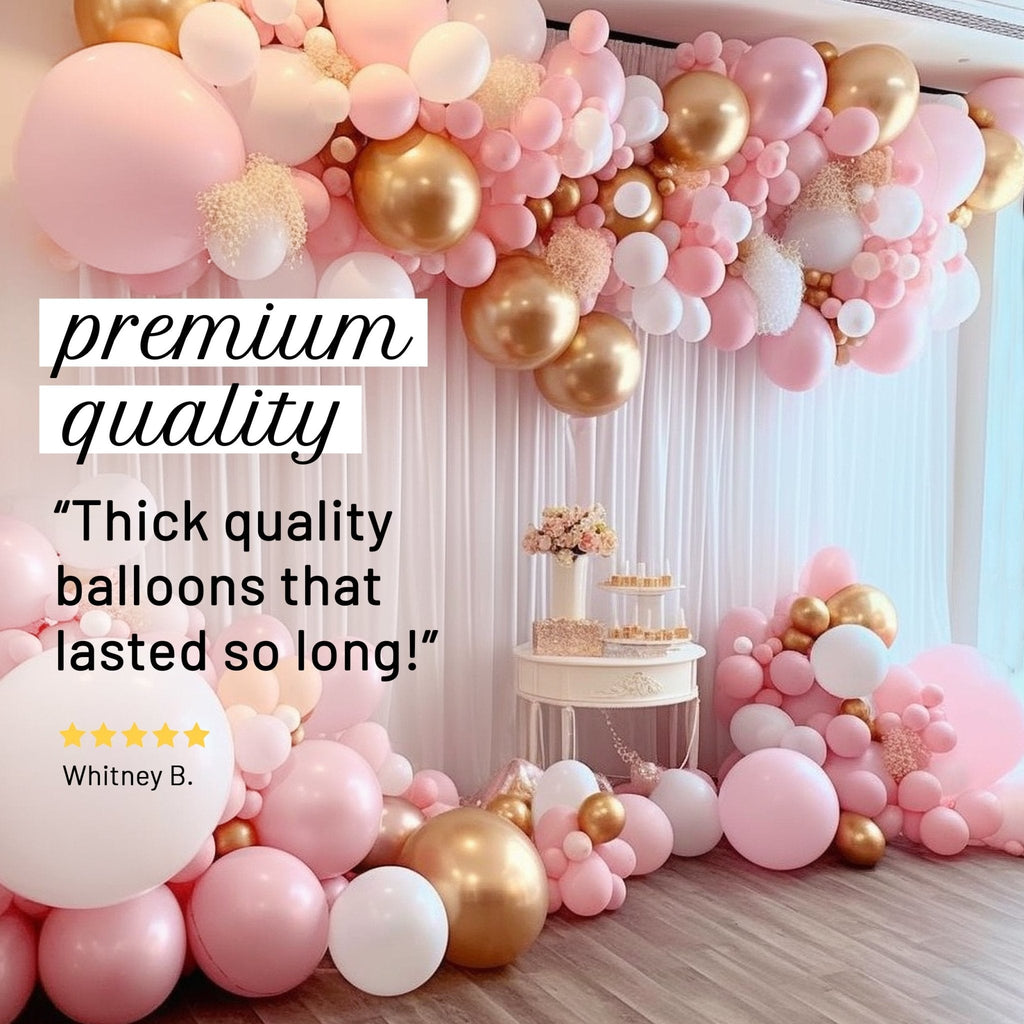 Pink, gold, and white balloon arch with decorative elements and text on a light background