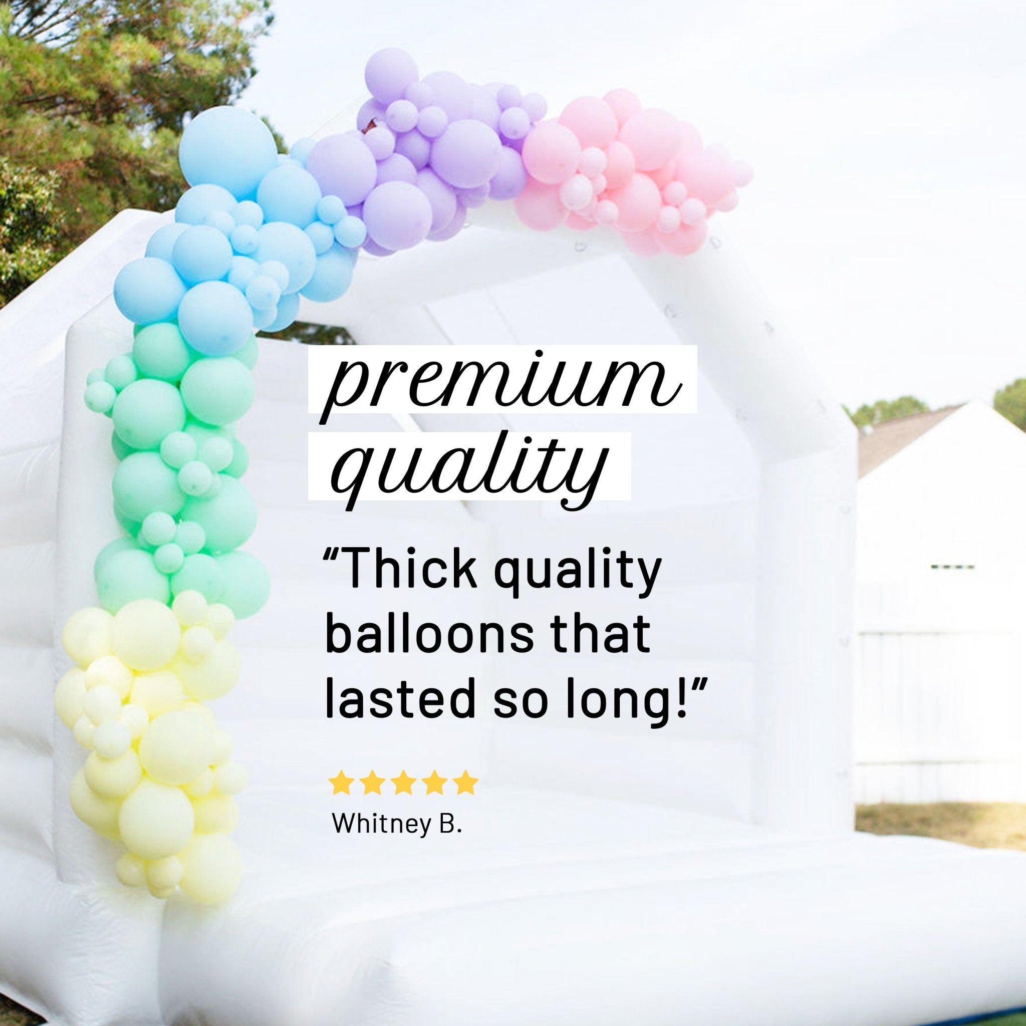 Colorful balloon arch with text praising the quality of the balloons.