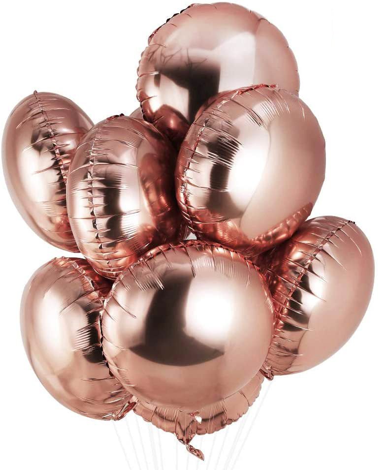 Rose gold heart-shaped balloons on a white background