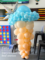 Balloon sculpture in the shape of a cloud with 'Ellie's Grab & Go Balloon B' branding.